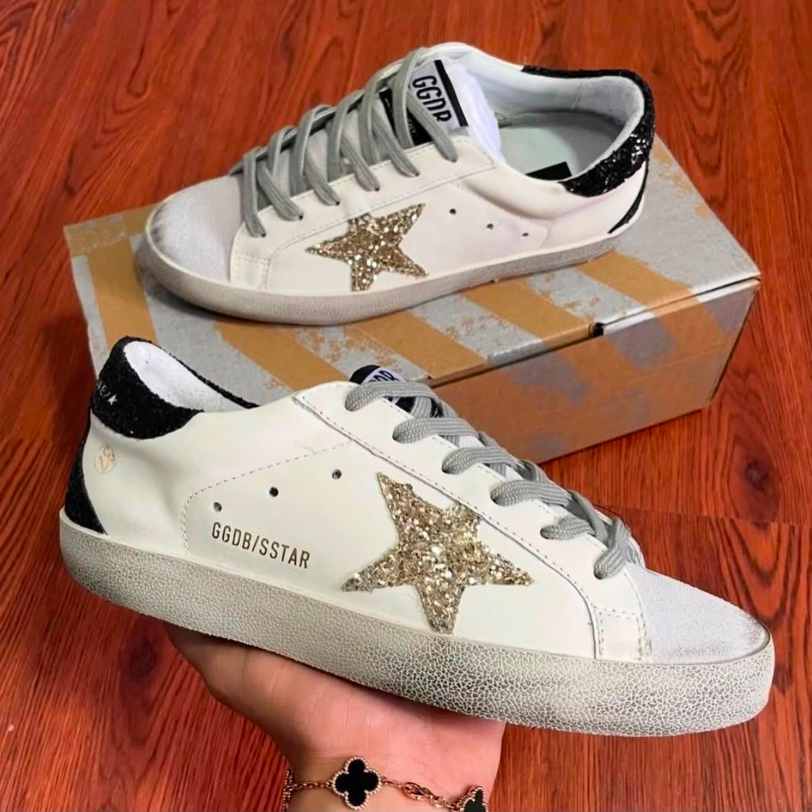 GOLDEN GOOSE ESTRELLA DORADA TALON NEGRO | DAMA